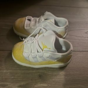 Jordan 11 retro low yellow snakeskin